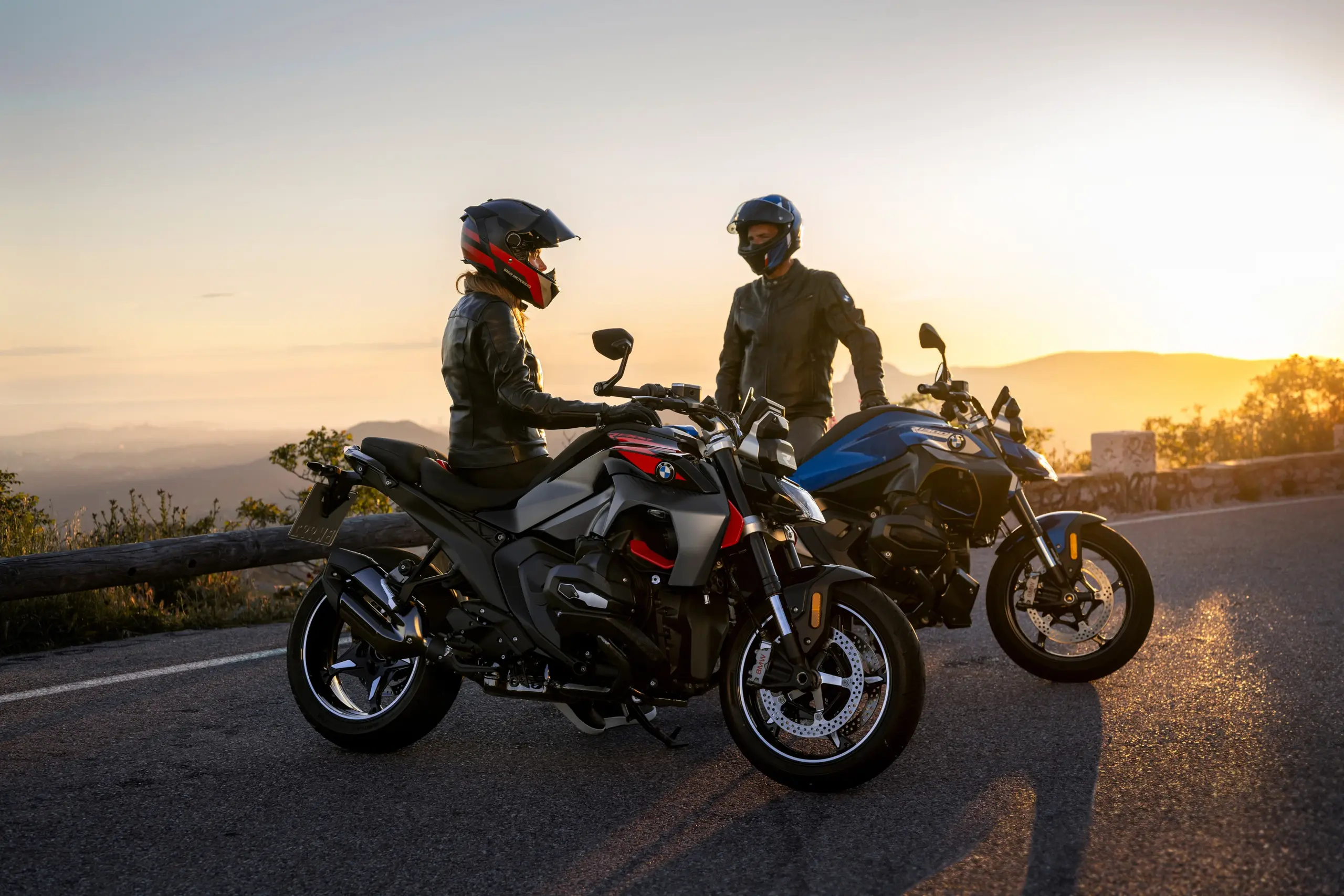 2026 BMW R 1300 R roadster riding on a winding mountain road.